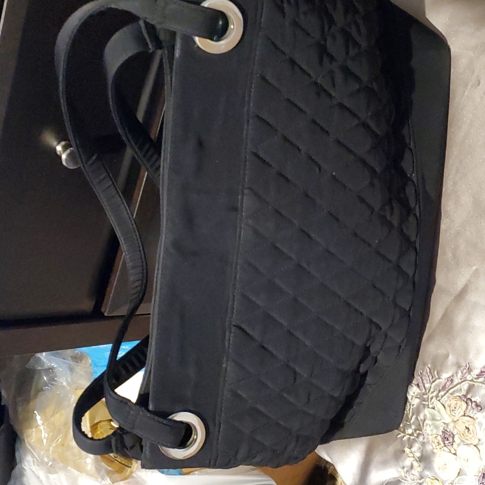 Black Vera Bradley 3 pockets inside